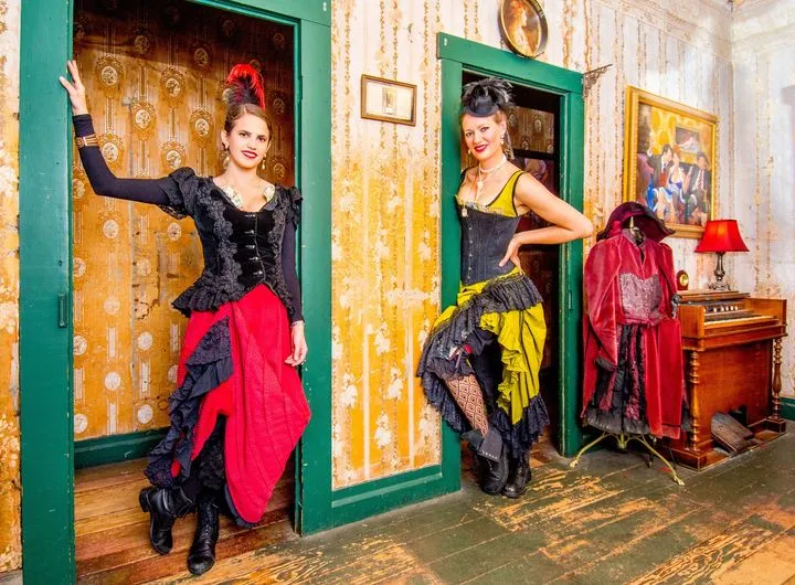 Tour guides in the brothel rooms